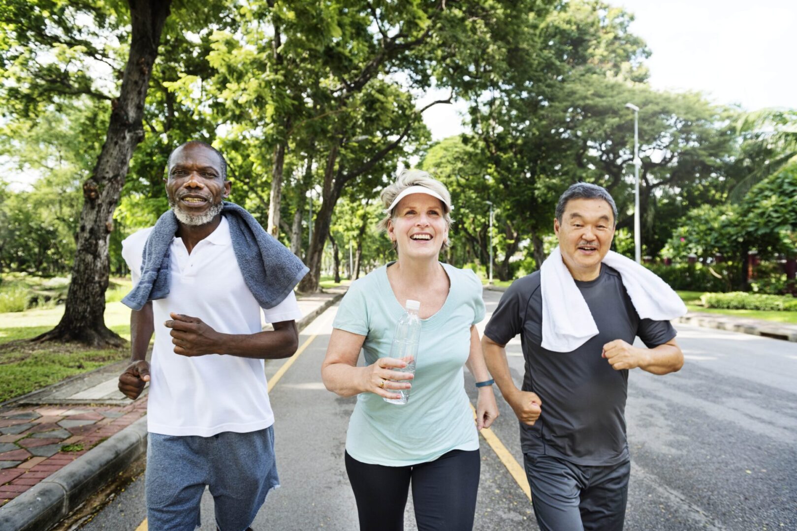 group-senior-friends-jogging-together-park-min